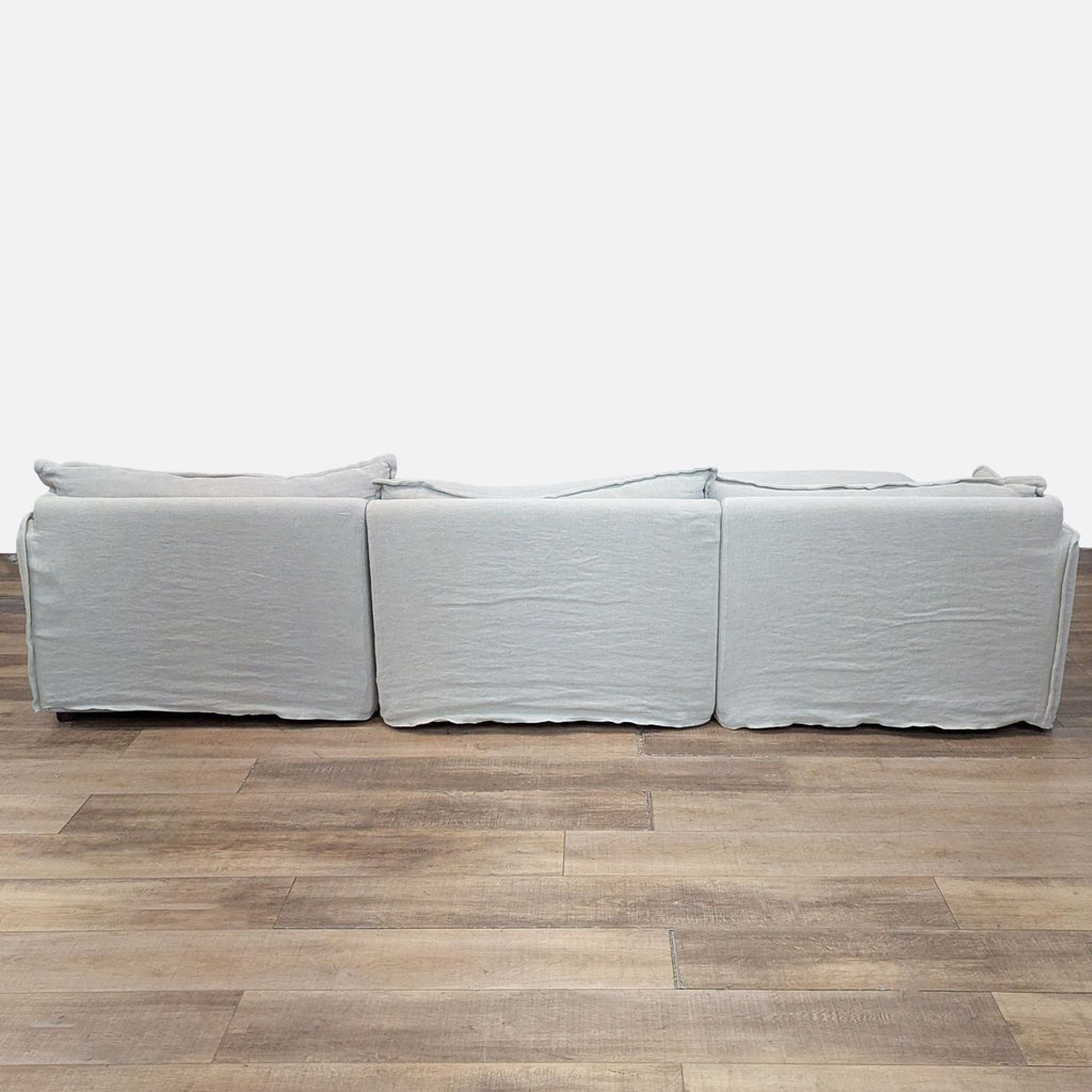Back view of Neva Chaise Sectional, highlighting soft slipcovers.