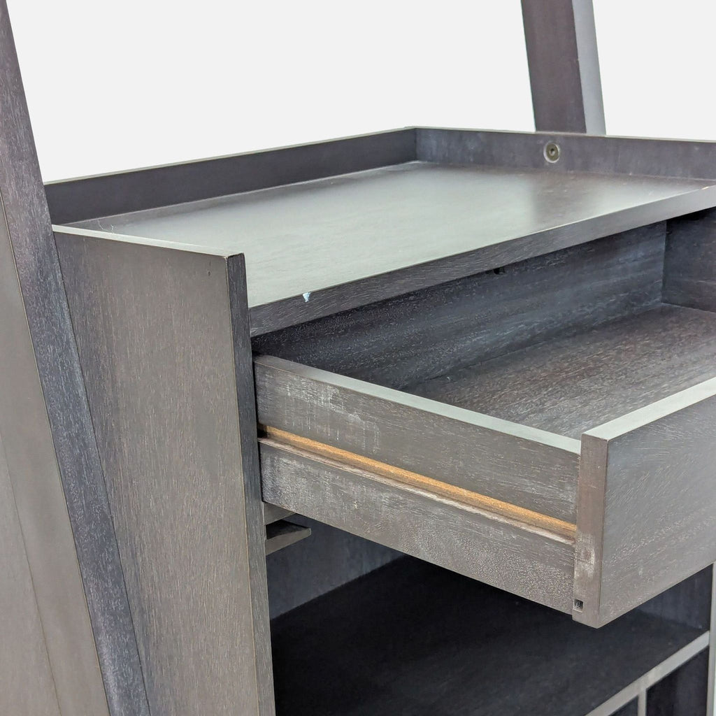 2. Close-up of middle unit with a drawer and storage for wine glasses and bottles.