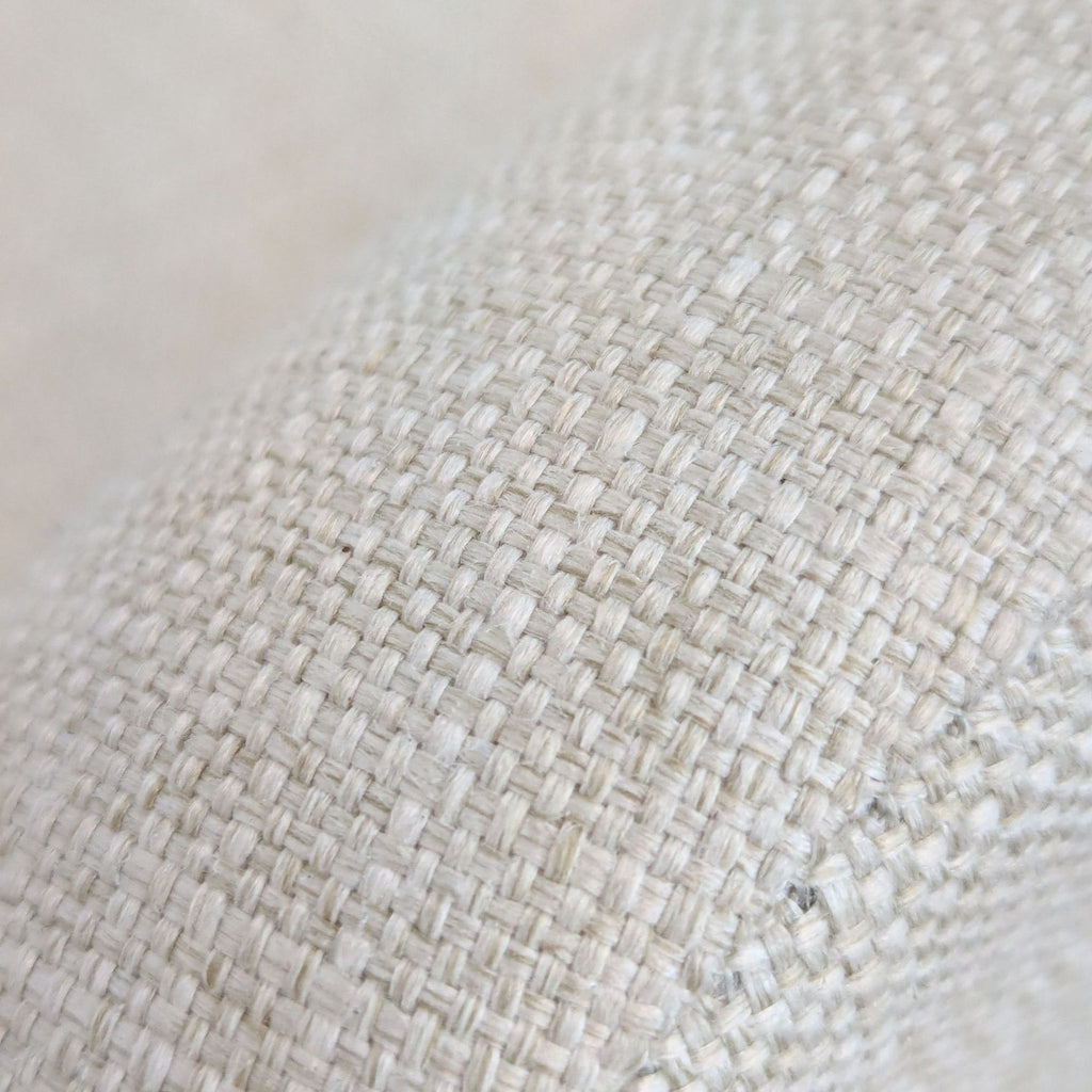 Close-up of linen blend woven upholstery on a Pottery Barn Kids lounge chair.
