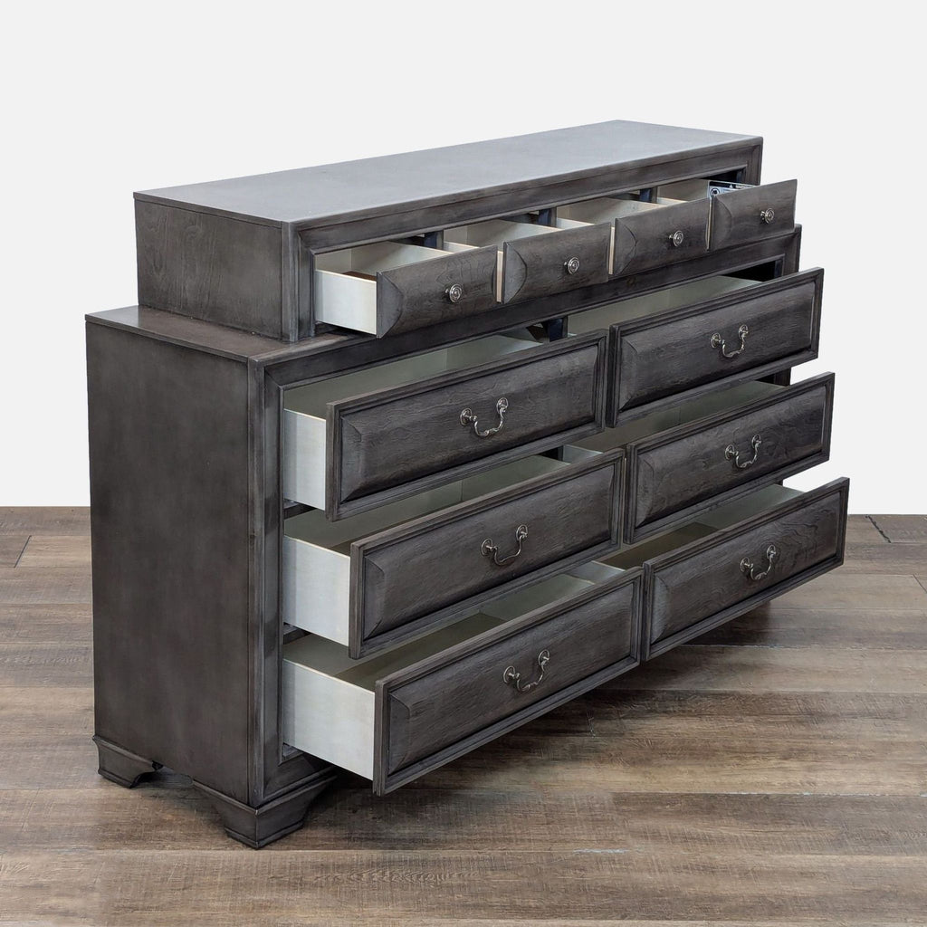 Angled view of dresser with open drawers showing smooth glides and ample storage space.