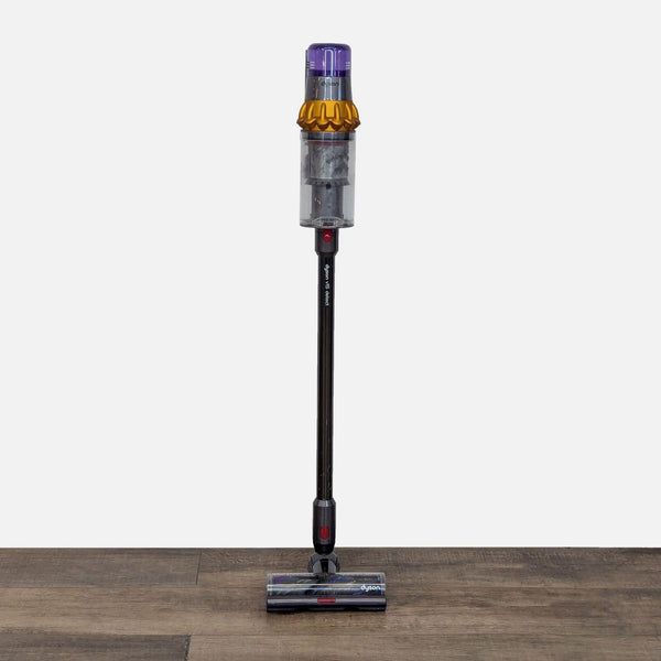 Dyson cordless vacuum for versatile cleaning on various surfaces.