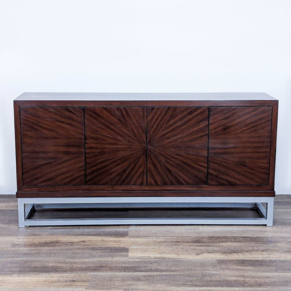 Sleek wood sideboard with sunburst doors and metal base.