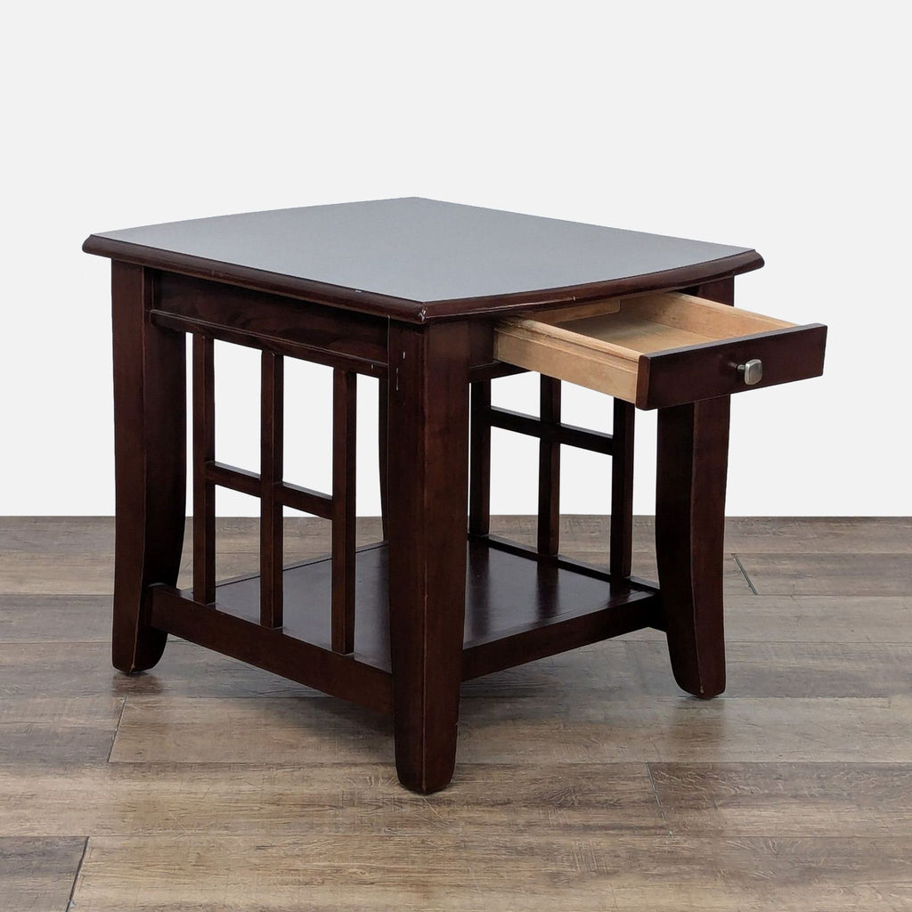 2. Angled view of a Reperch dark wood end table, displaying a pulled-out drawer and side panel details.