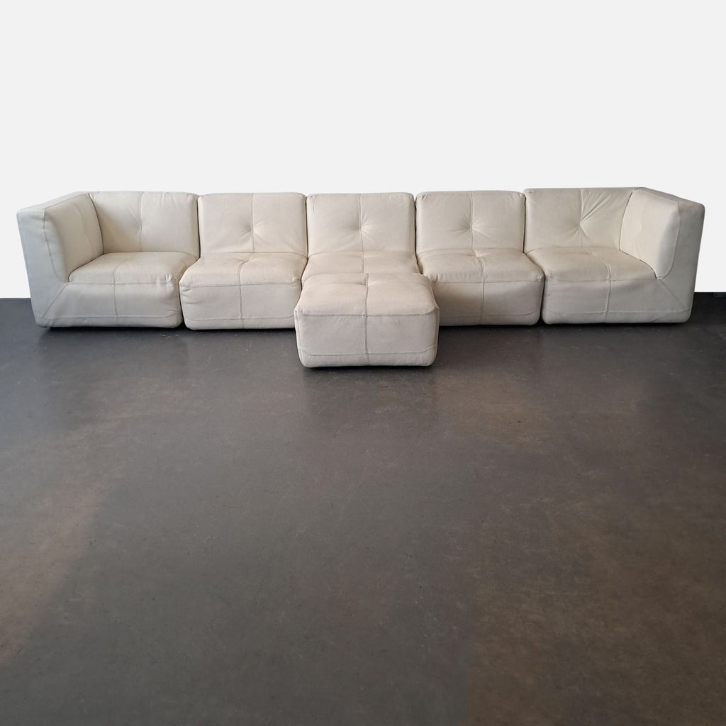 1. White leather Chateau D’ax sectional sofa with corner, seat modules, and ottoman on wood feet, modular design.  