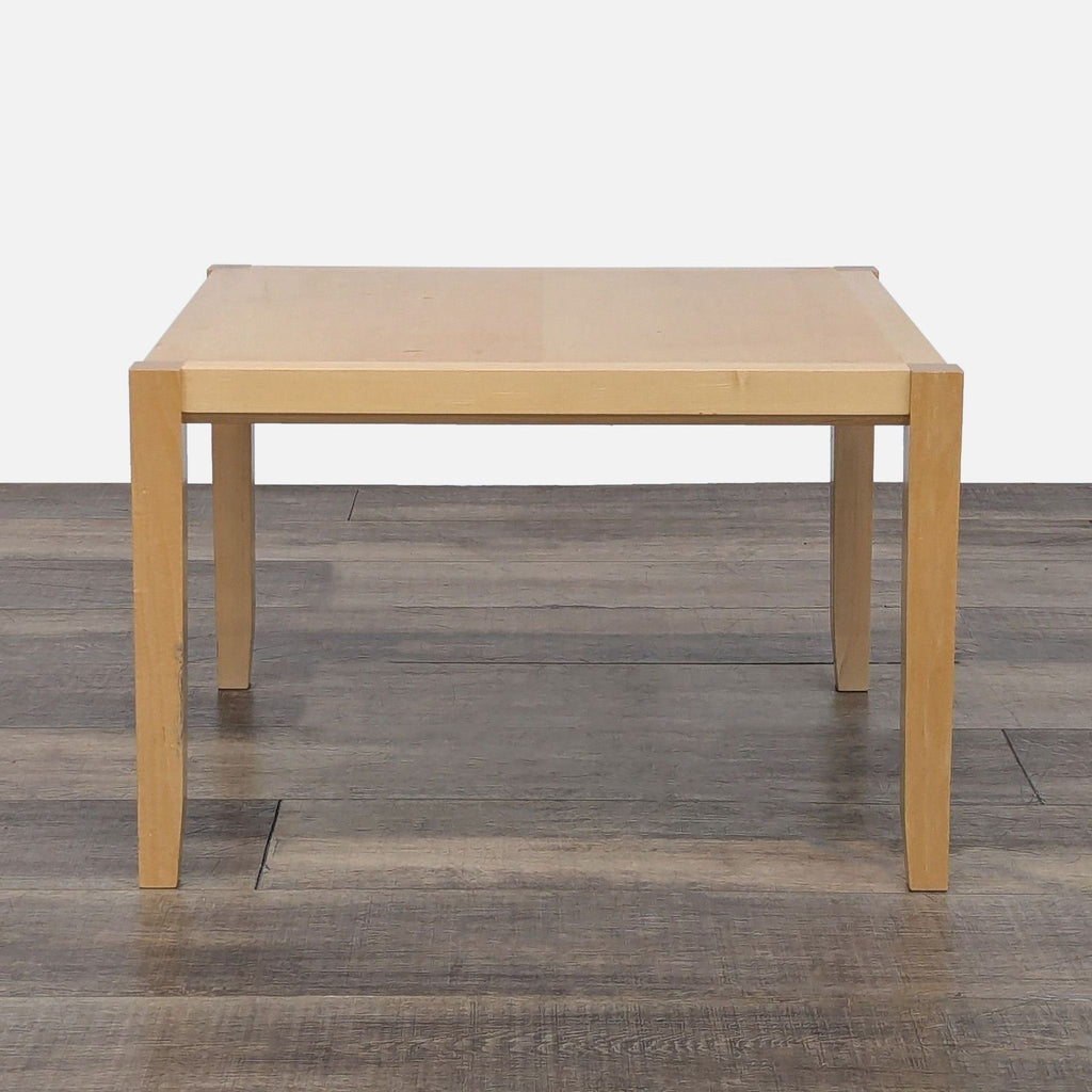 Modern Reperch End Table with a natural wood finish, complementing the wooden floor background.
