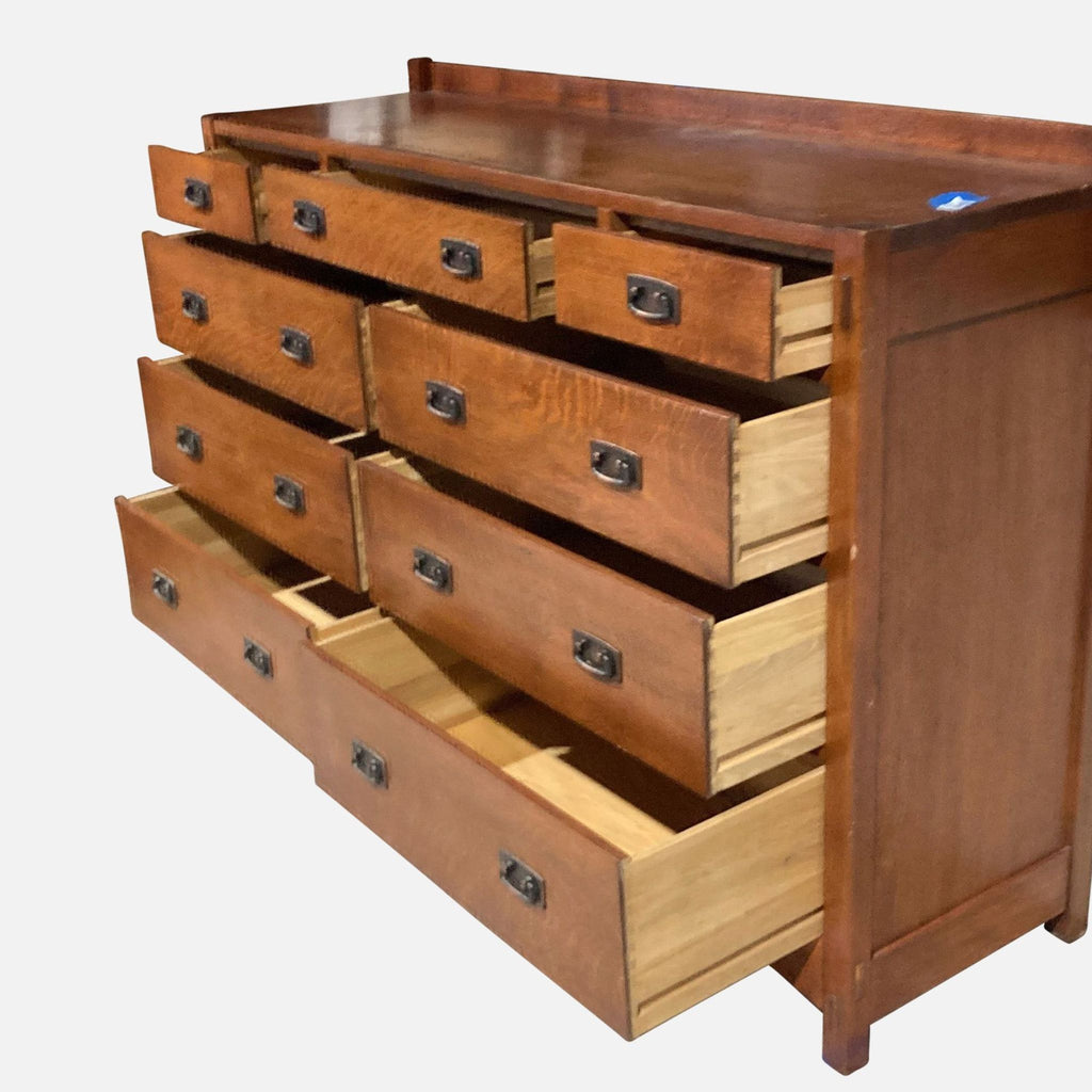 Side view of Stickley dresser with open drawers showing spacious interior.