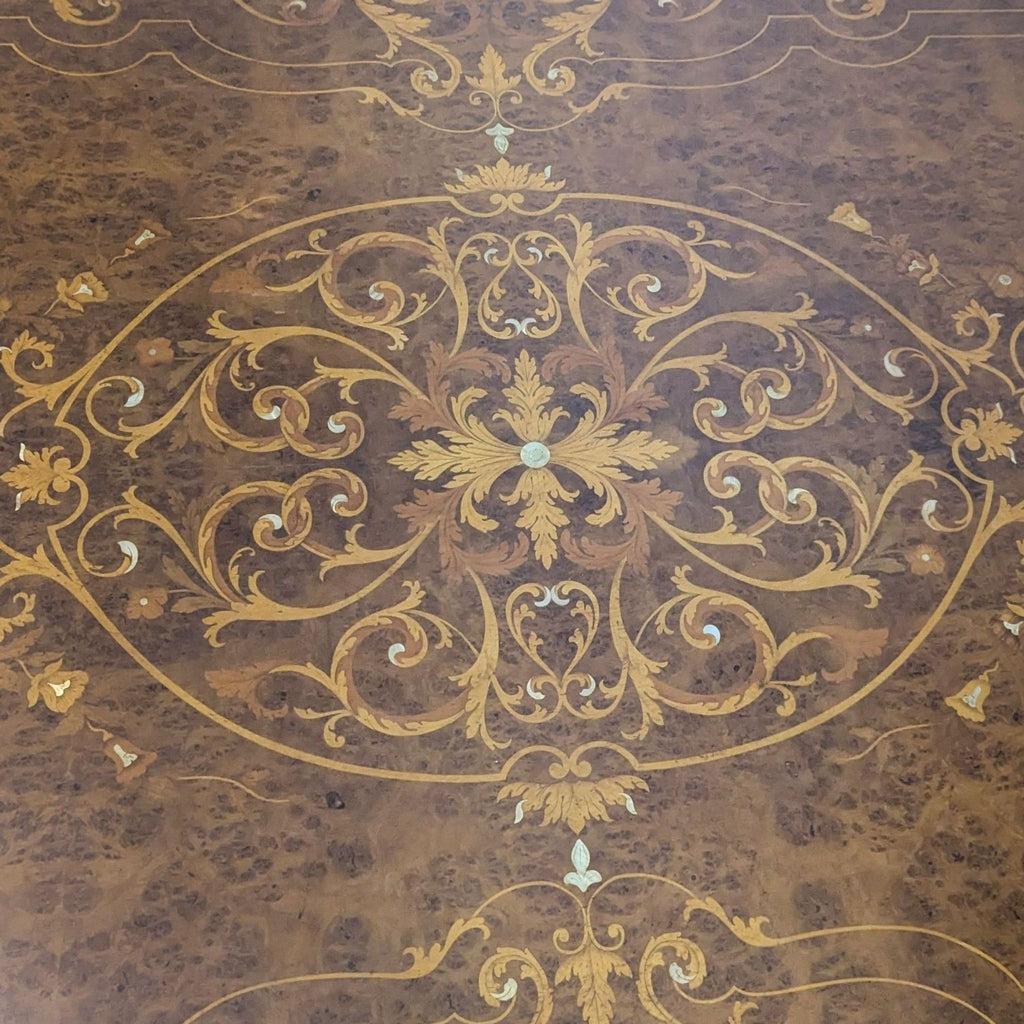 Intricate inlaid wood pattern on the custom Italian dining table by IFT.