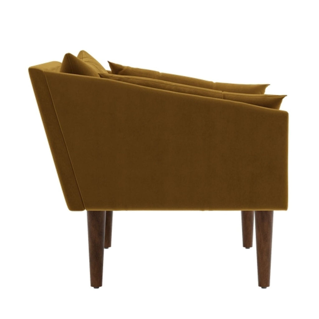 Side view of a Sabai lounge chair in recycled velvet.