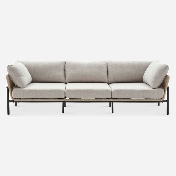 Castlery sofa with aluminum and resin wicker frame, featuring grey Olefin cushions.