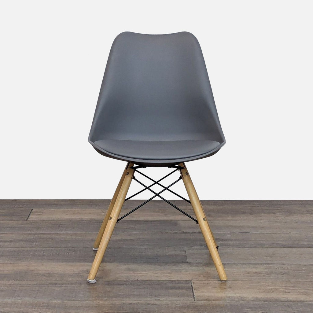 Front view of a dining chair with a gray plastic seat and wooden legs with metal bracing.