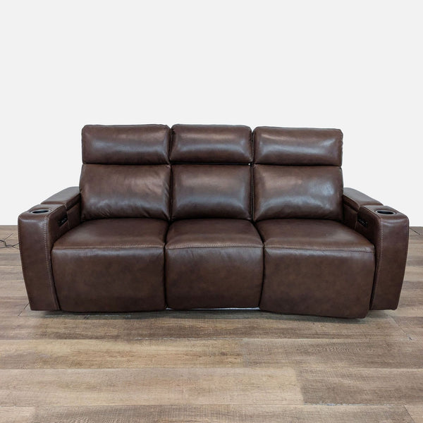Three-seat leather recliner with wireless charging and armrest storage.