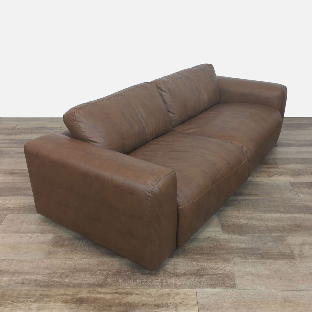 Vegan leather Colamy sofa, deep-seated, cozy 3-seat design.