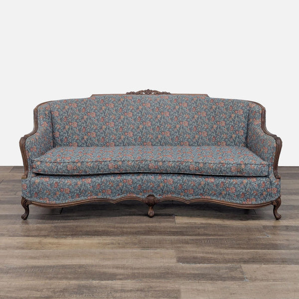 Reperch 3-seat sofa with wood carving and floral upholstery.