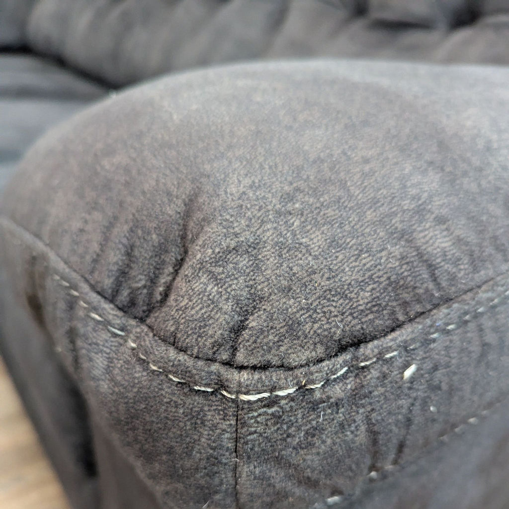 Ashley Furniture Accrington Contemporary Sofa with Chaise and Ottoman