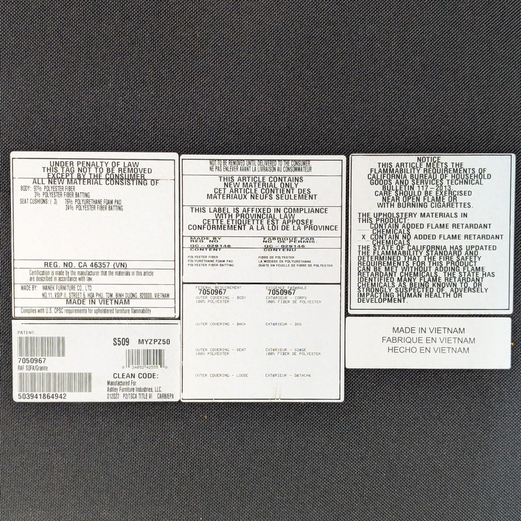 Ashley Furniture Accrington Contemporary Sofa with Chaise and Ottoman