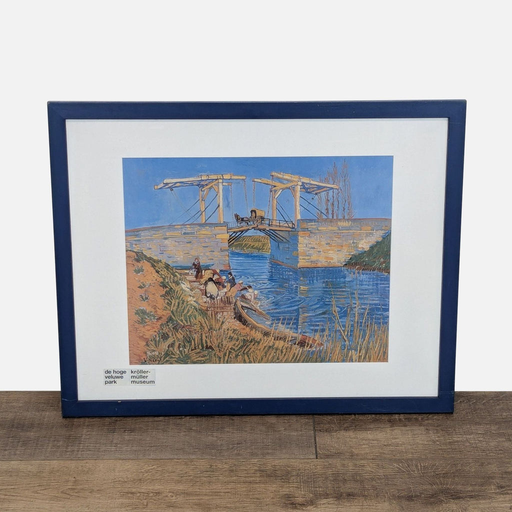 Framed print of Van Gogh's Langlois Bridge, featuring vivid yellows and blues.