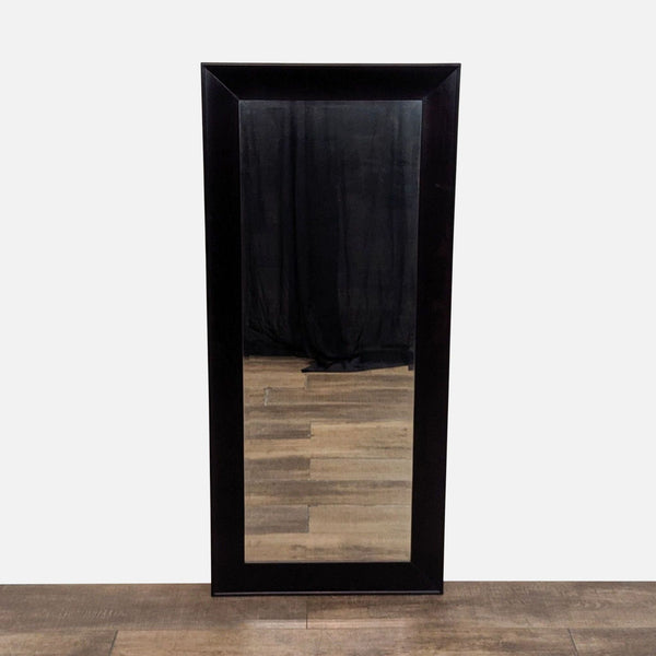 1. Rectangular Reperch mirror with a wide, dark frame, standing on a wooden floor against a light background.