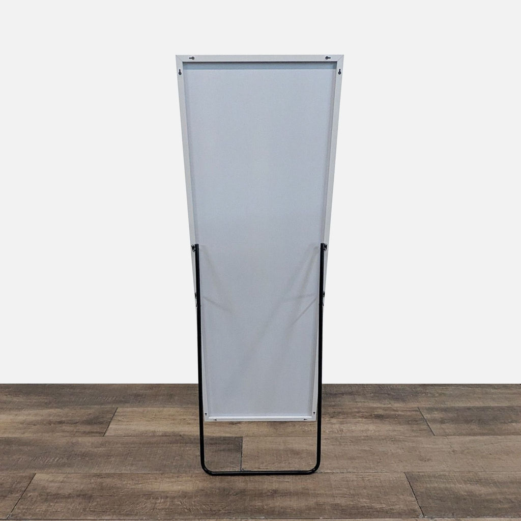 Back of the freestanding mirror showing support legs.