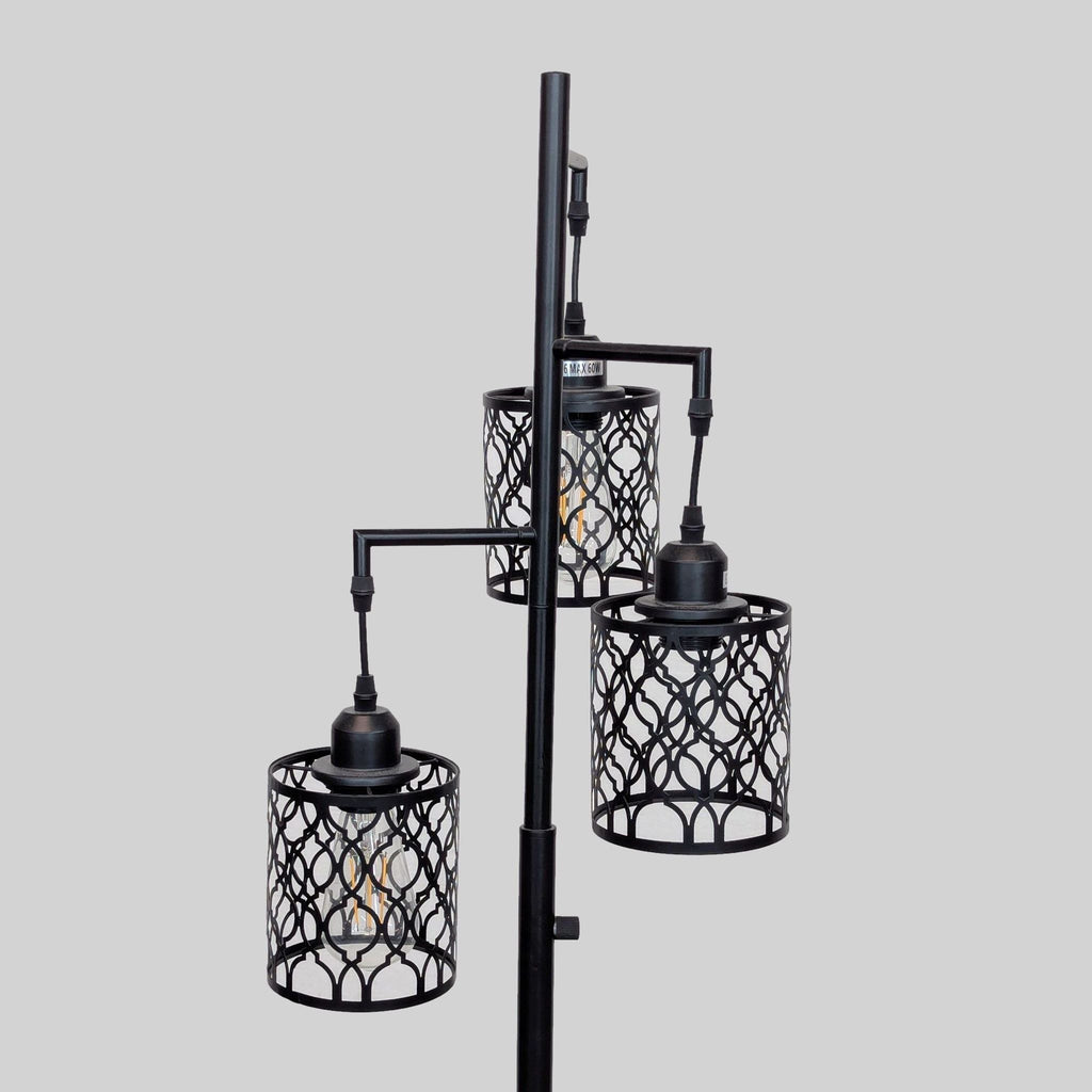 Close-up of ROTTOGOON's three metal cage light design.