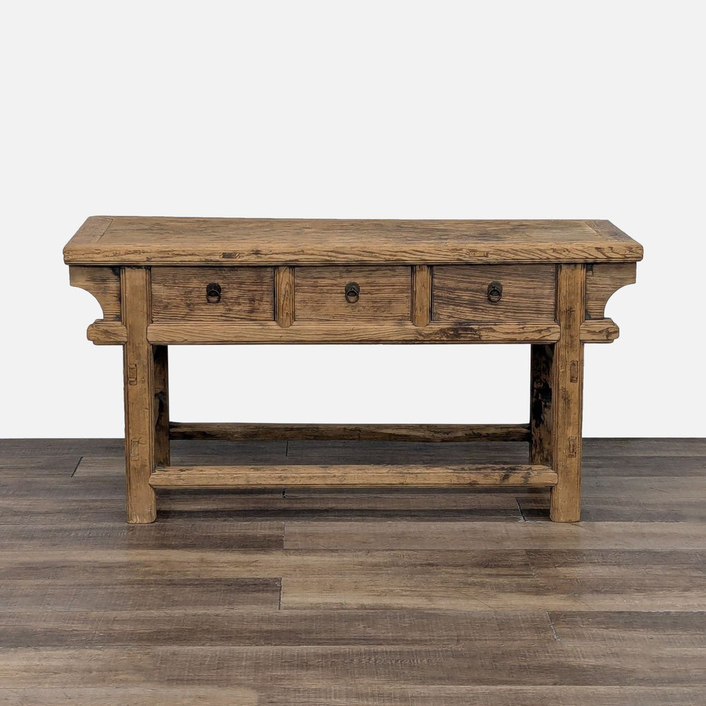 Rustic wooden console table with three drawers by Reperch.