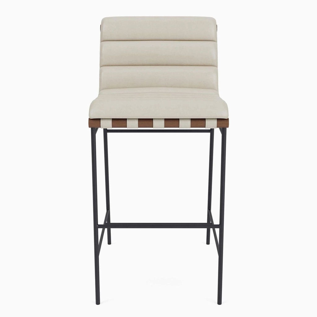Front view of a Denver Modern stool with pearl leather upholstery, walnut dowel, and a steel frame.