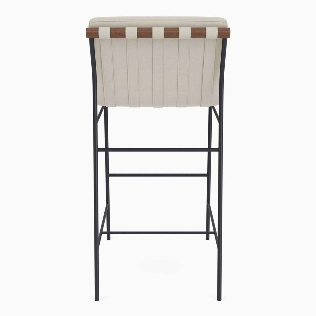 Back view of a stool with leather strap detailing and a steel frame.