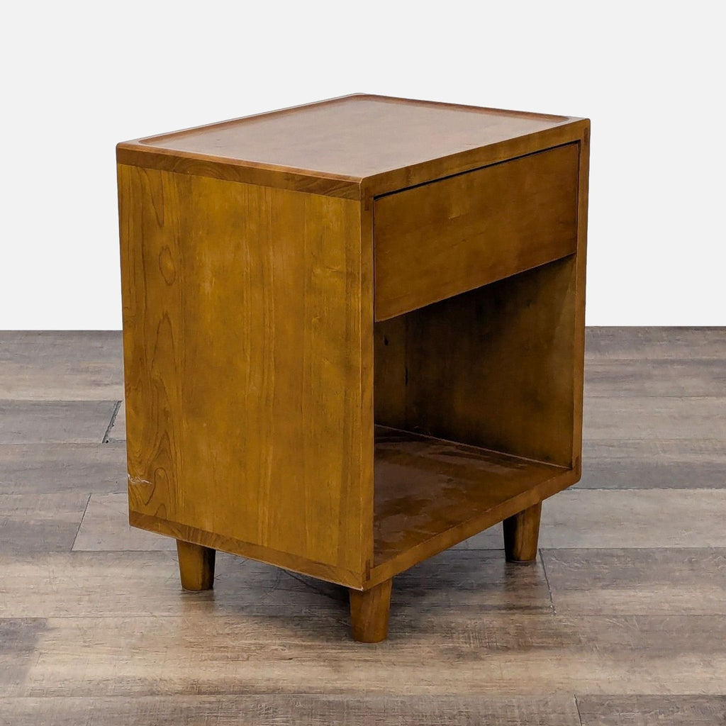 Angled view of a Floyd Home end table highlighting its sleek design and storage space.