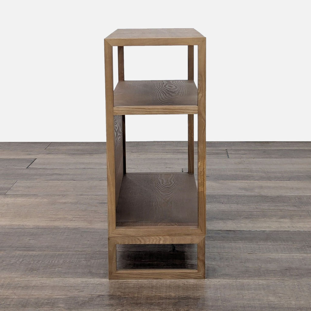 Inside Weather two-tier bookshelf with smooth wood design and attached anti-tip hardware for safety.
