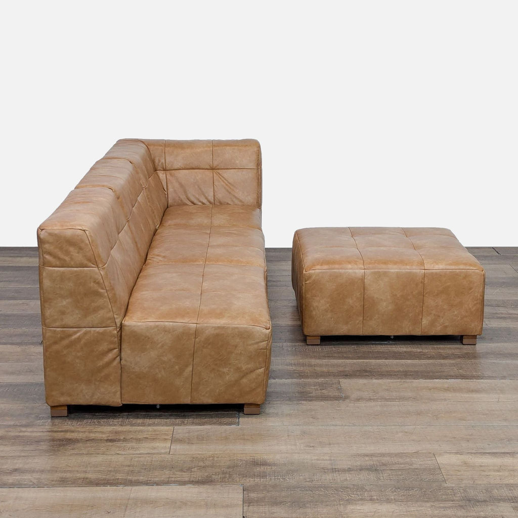 Three-piece modular sofa set in tan faux leather.  