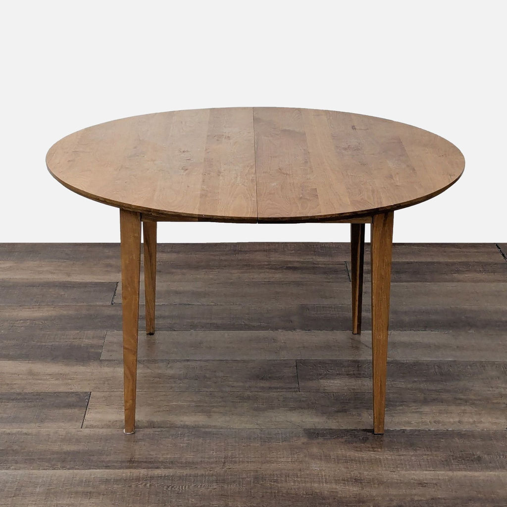 Wooden table close-up showing walnut grain texture.