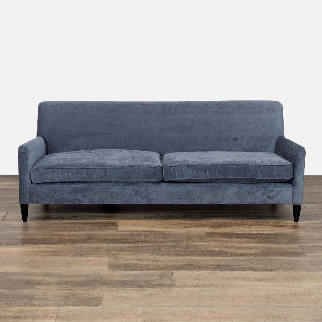 Danish mid-century modern sofa with velvet upholstery and wood legs in a 3-seat design.