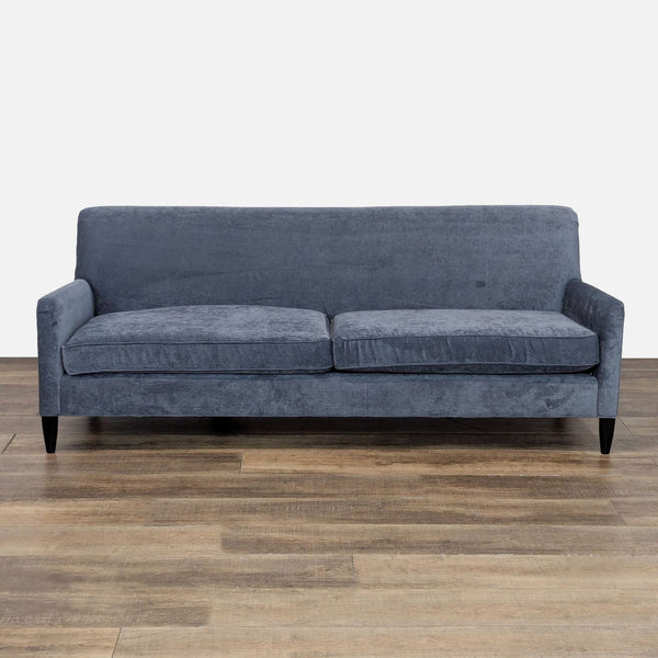 Danish mid-century modern sofa with velvet upholstery and wood legs in a 3-seat design.