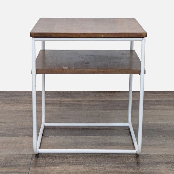 West Elm end table with mango wood surfaces and white metal frame.