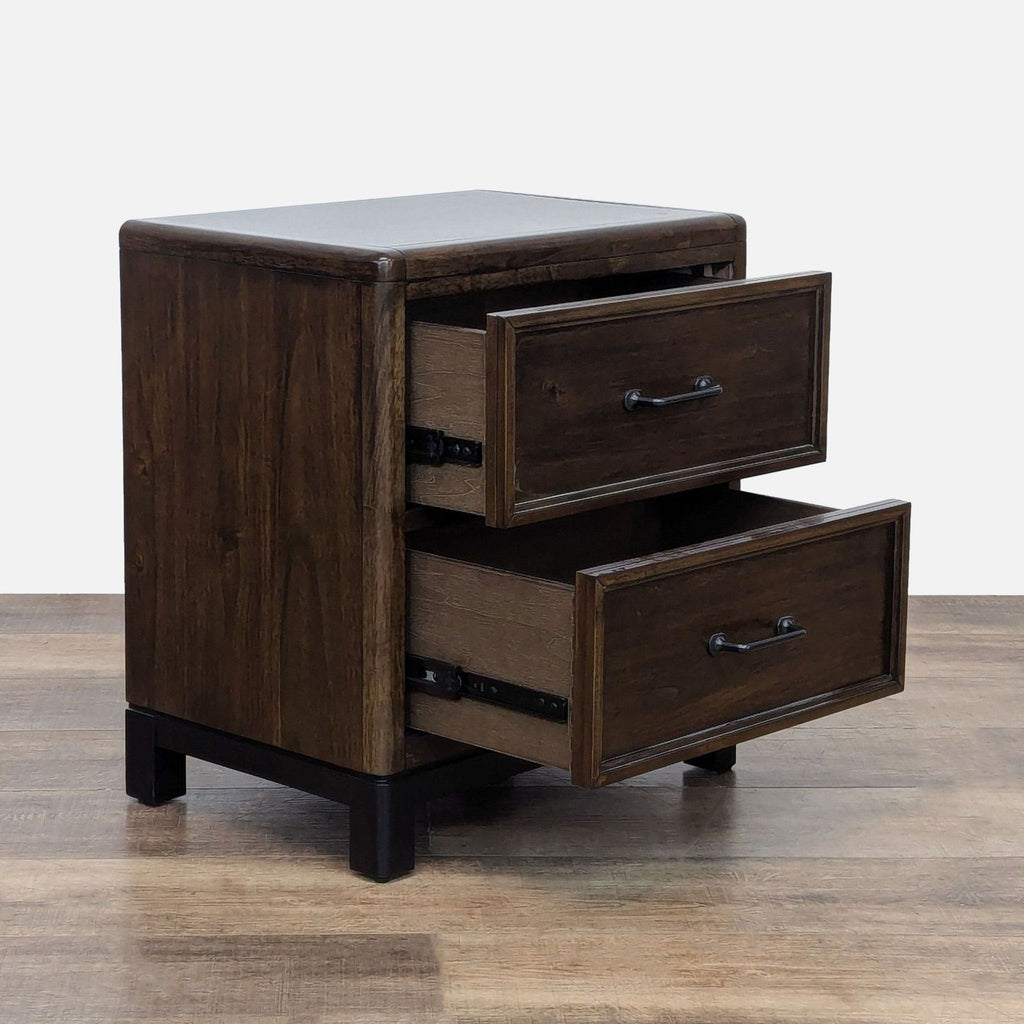 Side view of a two-drawer nightstand with drawers open.