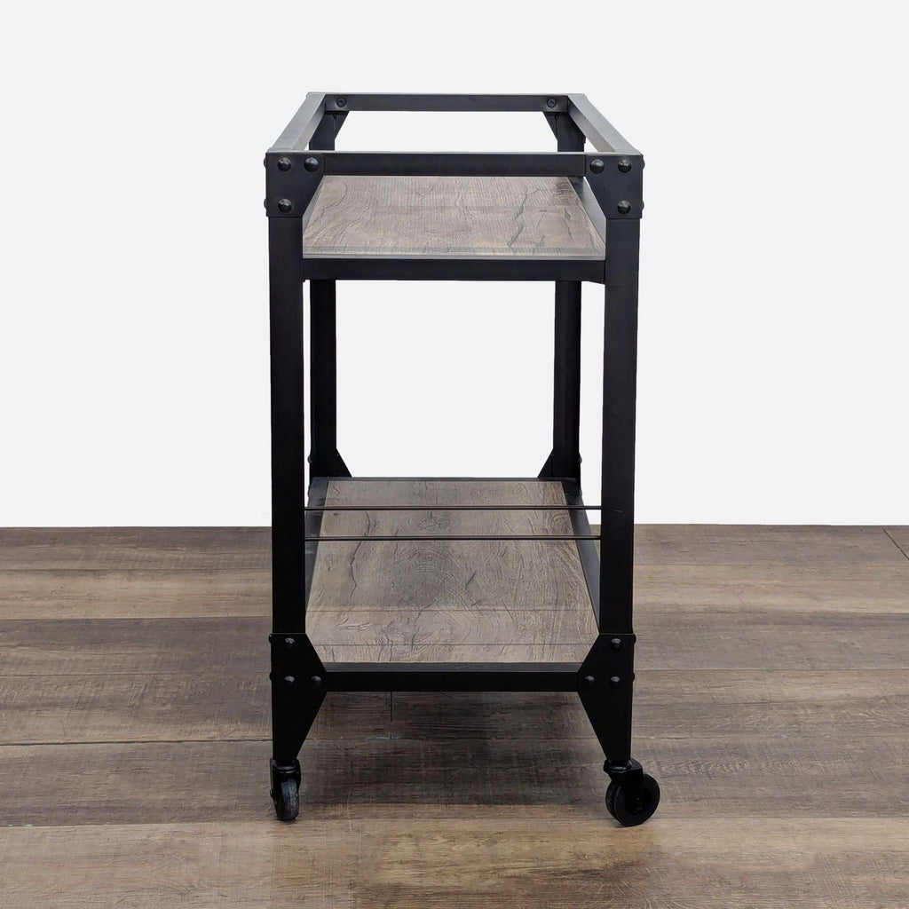 Industrial-style bar cart with wooden shelves and metal structure, suitable for glasses and bottles.