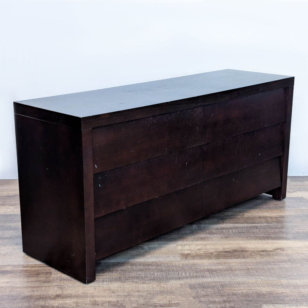 Side view of Ethan Allen dresser with dark wood and clean lines.