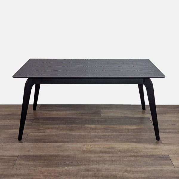 Modern walnut dining table with a butterfly leaf, extends to 83 inches.