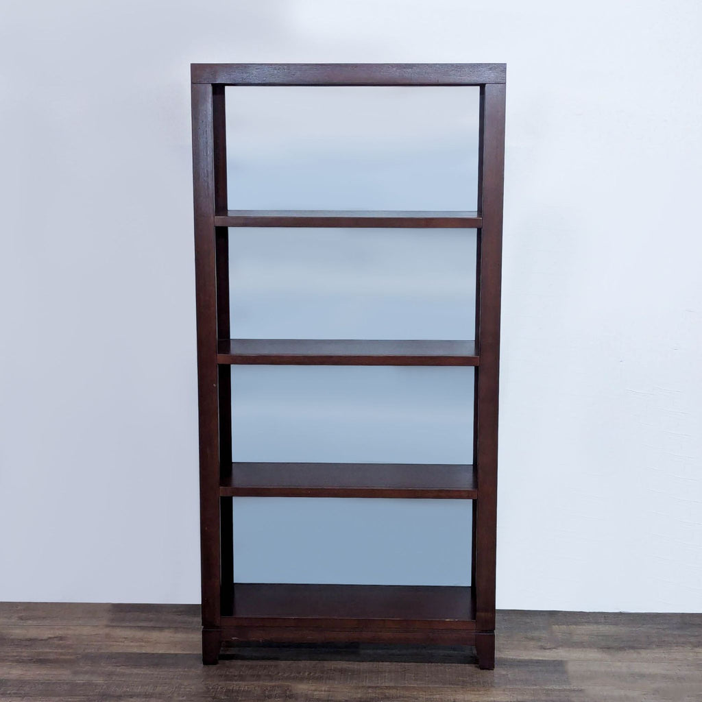 Elegant dark oak bookshelf with four fixed shelves.