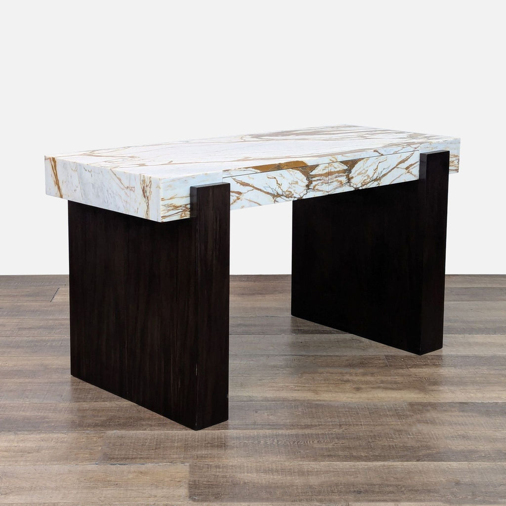 Modern desk combines marble and walnut, highlighted by oversized block legs and sleek design.