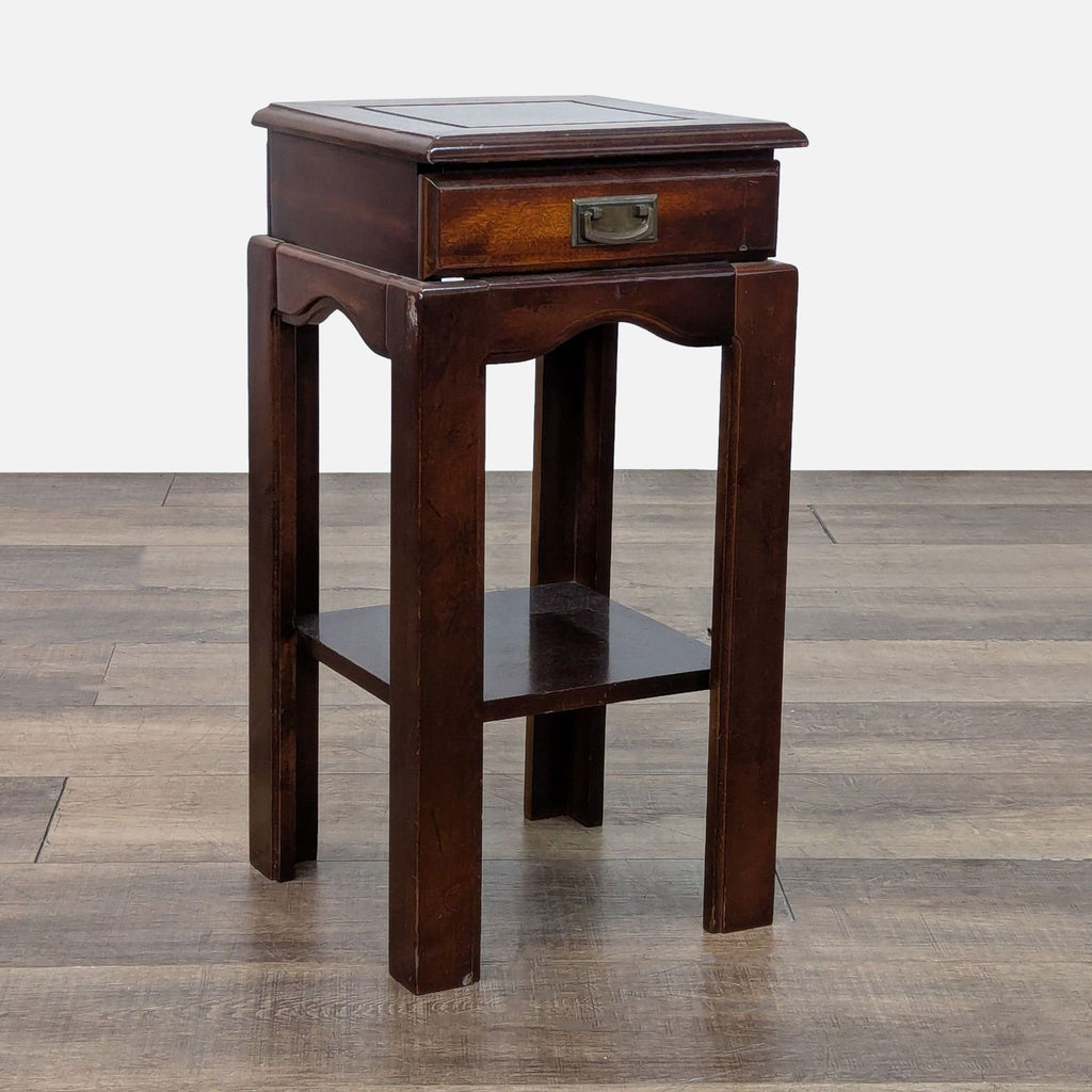 Elegant wooden side table featuring a drawer and shelf.
