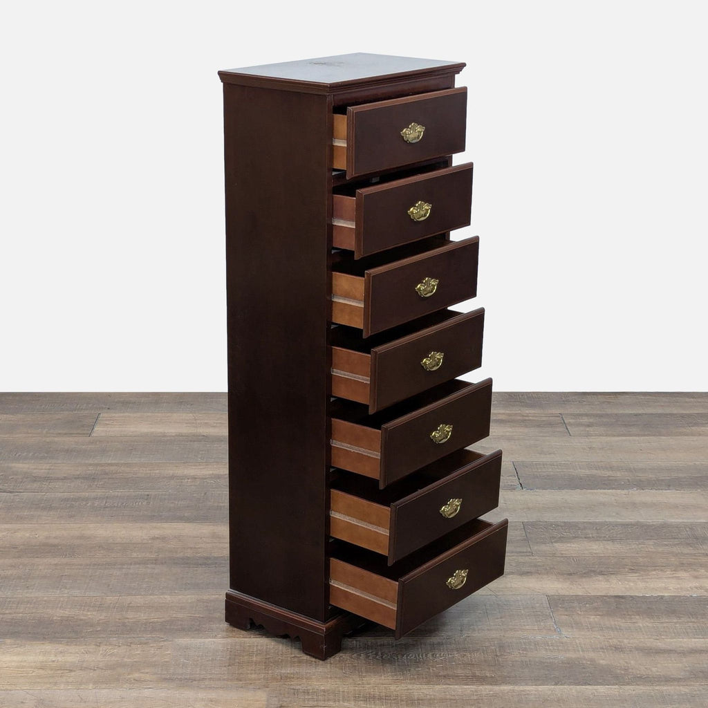 Side view of a seven-drawer dresser, drawers open.