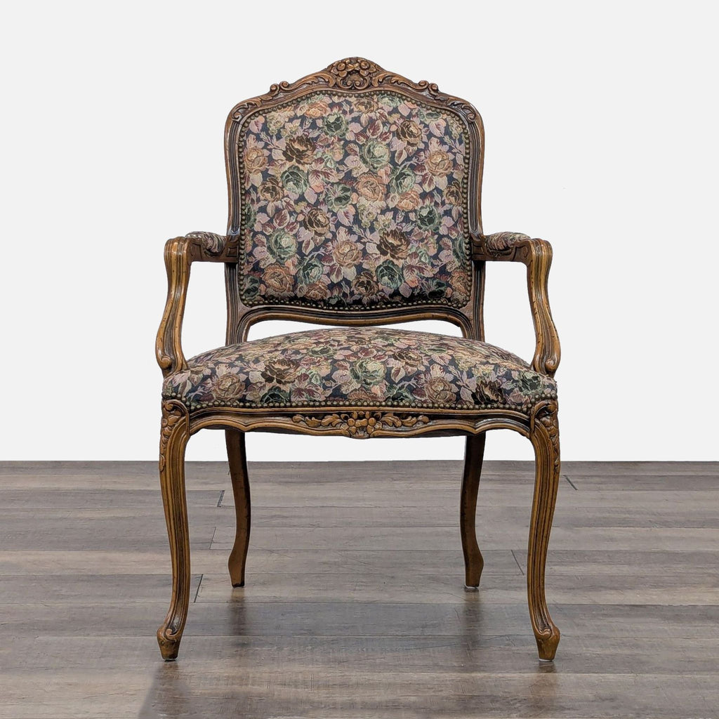 Ornate wooden frame chair with floral upholstery from Chateau D'Ax.