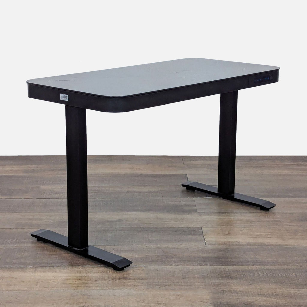 Modern desk with a black powder-coated steel frame from airLIFT.