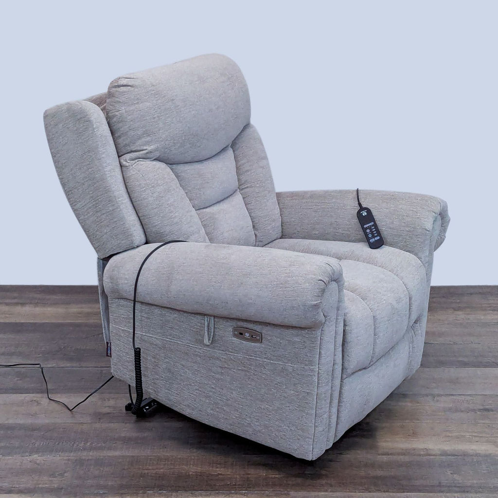 Angled view of a plush lounge chair with massage and heat functions.