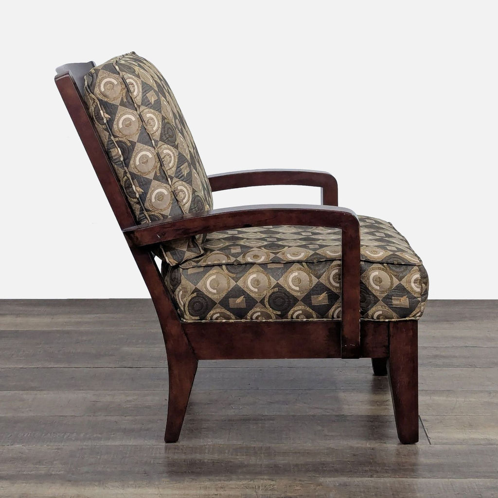 Side view of a lounge chair with a geometric design and wood frame.