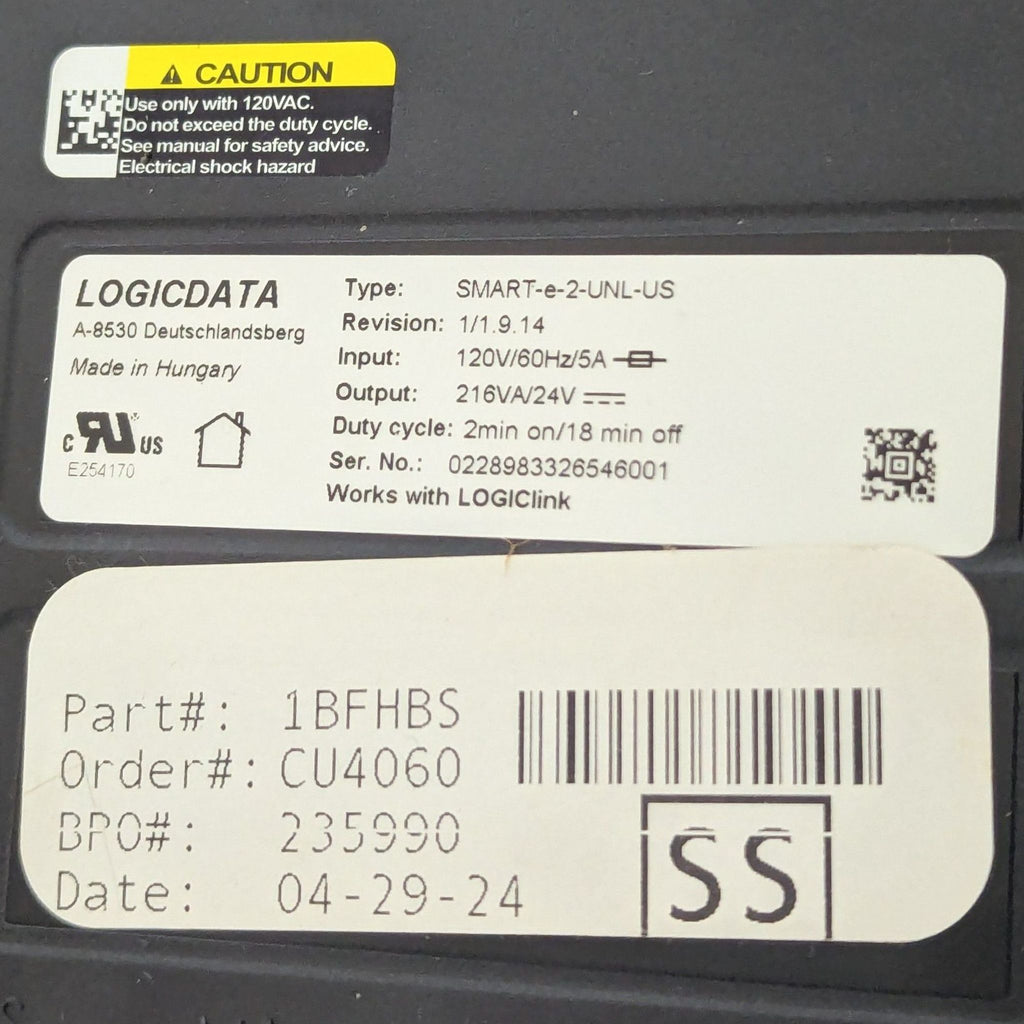 Close-up of the desk's technical specifications and caution label.