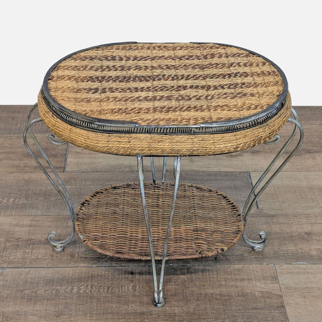 Top view of Reperch side table featuring woven wicker surface and curved metal legs.