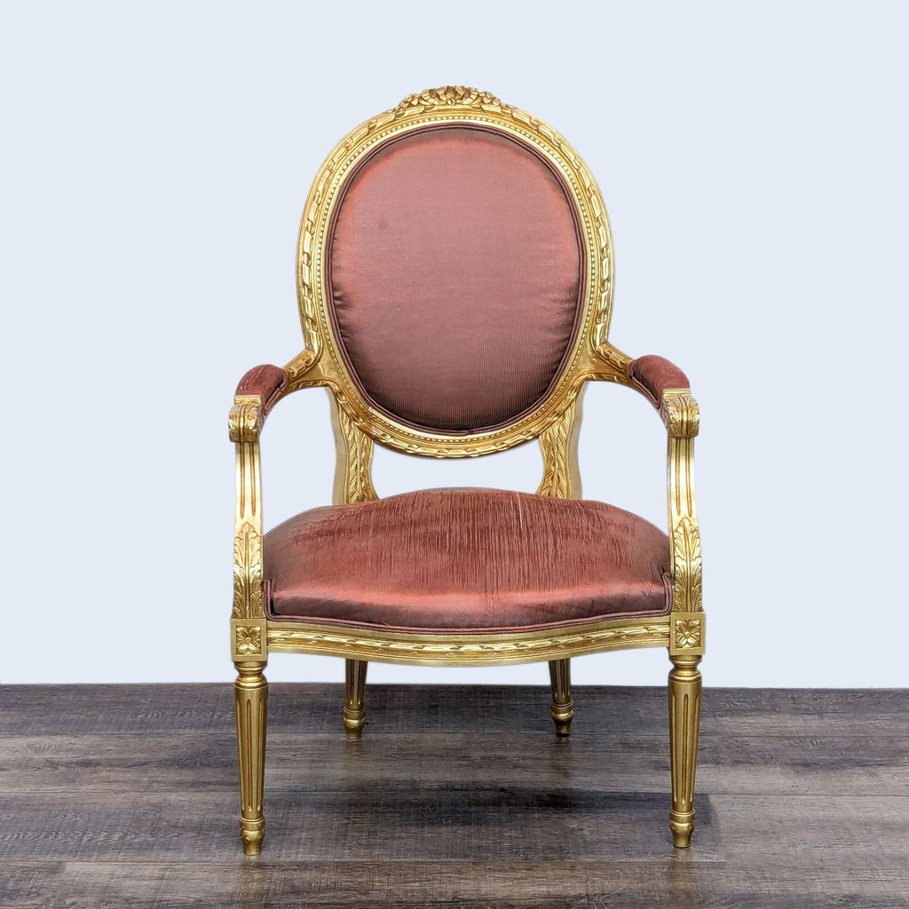 Front view of a gold French Provincial armchair with upholstered seat and back.