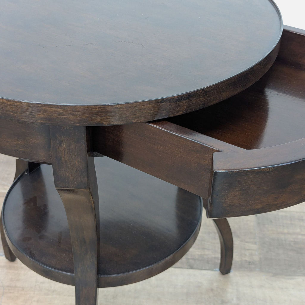 Close-up of table showcasing the open drawer and finish.