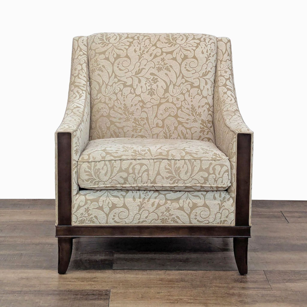 Lounge chair with floral upholstery, dark wood trim, and legs by Kravet Furniture.